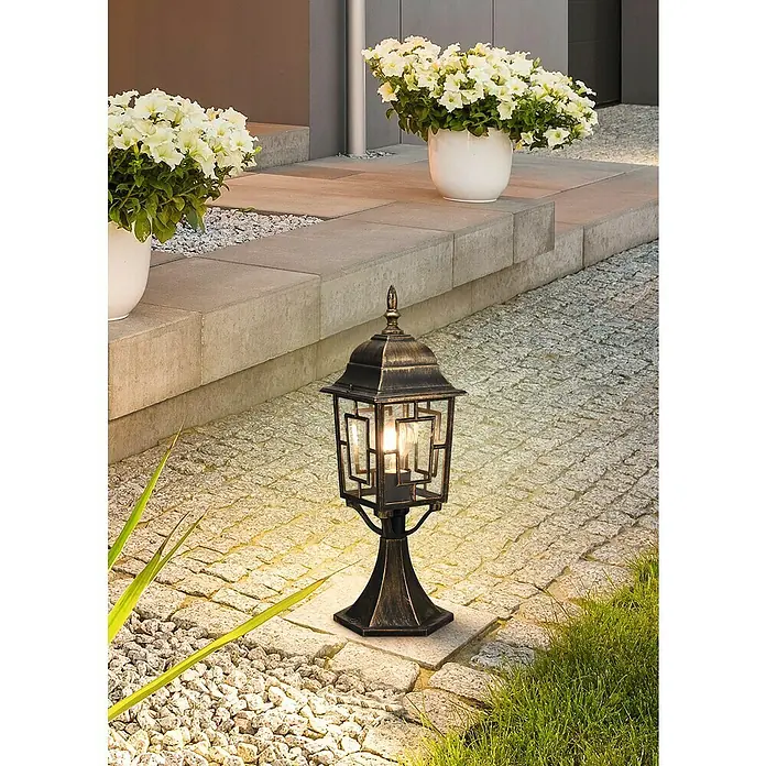 Trio Lighting Sobremuro exterior Volturno - Color del marco: Bronce, 17 x 15 x 47 cm, Sin bombillas - La farola decorativa de aspecto antiguo con luz cálida proporciona una iluminación ambiental en el área exterior y añade ese algo especial a su jardín.