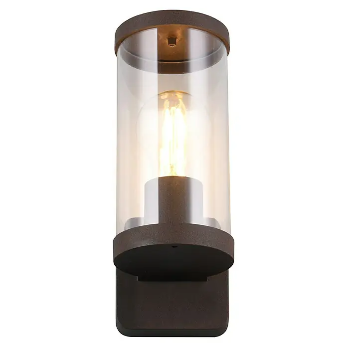 Trio Lighting Aplique exterior Bonito - 28 W, 9 x 9 x 23 cm, Marrón, IP44 - Primer plano de una lámpara de pared para exteriores con un cilindro de vidrio transparente y un acabado marrón rústico, que emite un brillo cálido.
