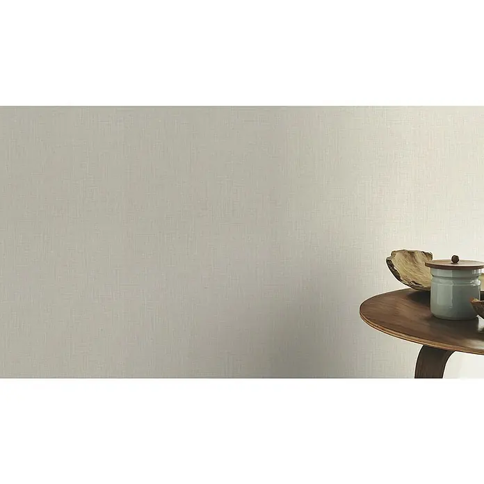 Rasch Selection Vliestapete Vinyl - Cremegrau, Uni, 10,05 x 0,53 m - Nahaufnahme einer strukturierten, cremefarbenen Tapete, die eine subtile Eleganz und Textur für moderne Innenräume bietet.