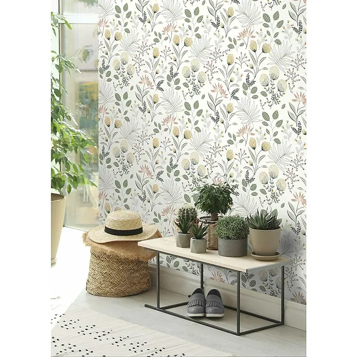 Rasch Selection Vliestapete Vinyl - Pastell/Moosgrün, Floral, 10,05 x 0,53 m - Eine einladende Szene mit einer Wandtapete mit floralem Muster, die eine gemütliche Atmosphäre schafft.