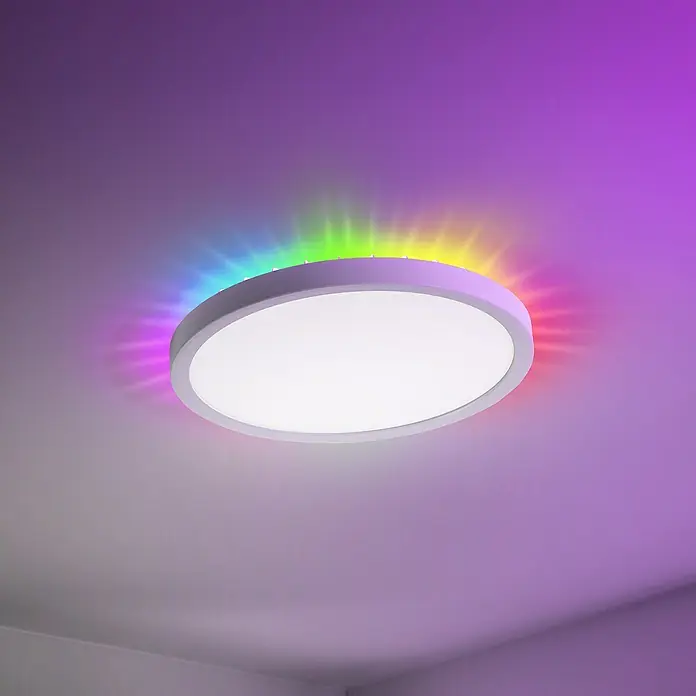 Garza Plafón LED redondo inteligente Tango - Ø x Al: 30 x 2,6 cm, RGB, Blanco - Una lámpara de techo LED que cambia de color y emite una iluminación multicolor vibrante, representando una solución de iluminación moderna.