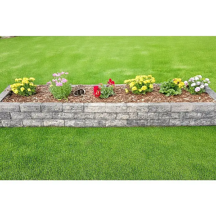 Diephaus Stamford Mauerstein - 30 x 10 x 10 cm, Schwarz/Weiß, Beton - Blumenkasten aus Ziegeln mit einer Vielzahl von bunten Blumen.