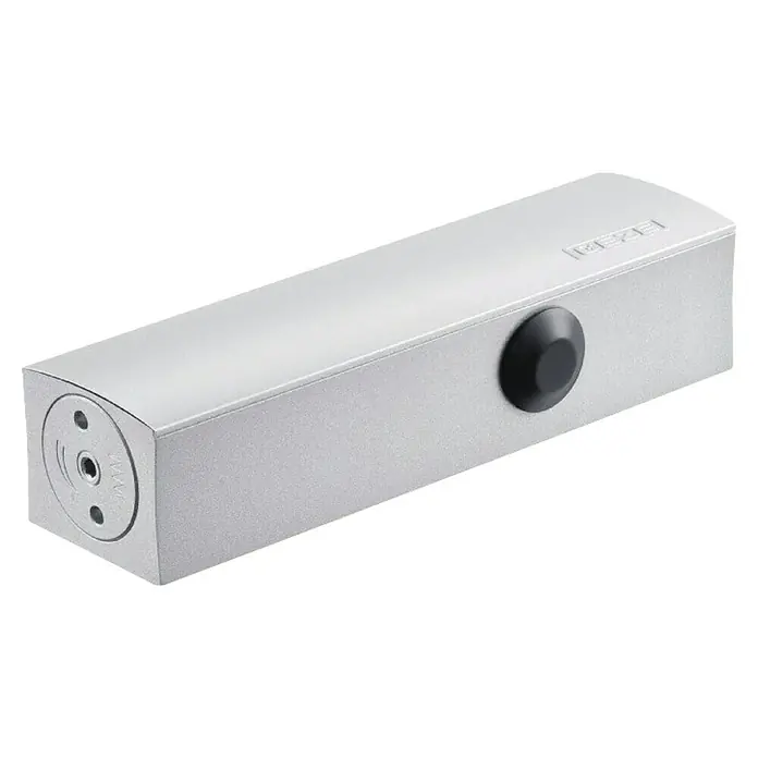 GEZE Türschließer TS 2000 - L x B x H: 226 x 60 x 48 mm, Max. Türbreite: 1.100 mm, Passend für: Feuerschutztür, Rauchschutztür, Silber - Nahaufnahme eines silberfarbenen GEZE Türschließers mit schwarzem Knopf und Schraubenlöchern an der Stirnseite.