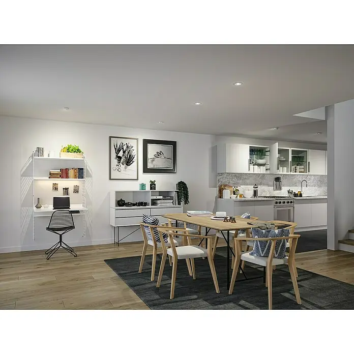 Paulmann LED-Einbauspot - Warmweiß, Durchmesser: 10,5 cm, Weiß, 1 Stk. - Eine moderne Esszene mit Holztisch, Stühlen und einem Teppich in einem hellen Raum, der Wohn- und Küchenbereich verbindet.