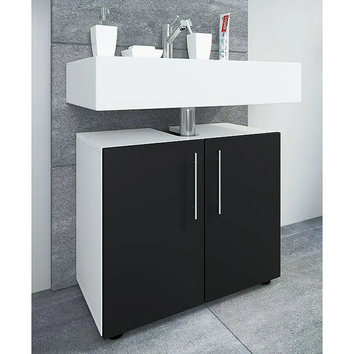VCM Flandu II Waschtischunterschrank - B x T x H: 60,2 x 29,6 x 50,7 cm, Weiß/Schwarz, Matt - Badezimmerschrank mit Waschbecken. Der Schrank ist schwarz-weiß und das Waschbecken ist weiß. Auf dem Waschbecken stehen verschiedene Badutensilien.