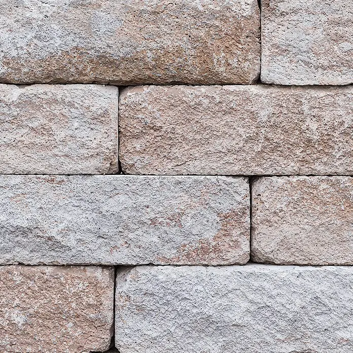 EHL Mauerstein Anzio Light - 50 x 18 x 15 cm, Sandstein, Beton - Gestapelte hellgraue, rau strukturierte Betonblöcke bilden eine Wand.