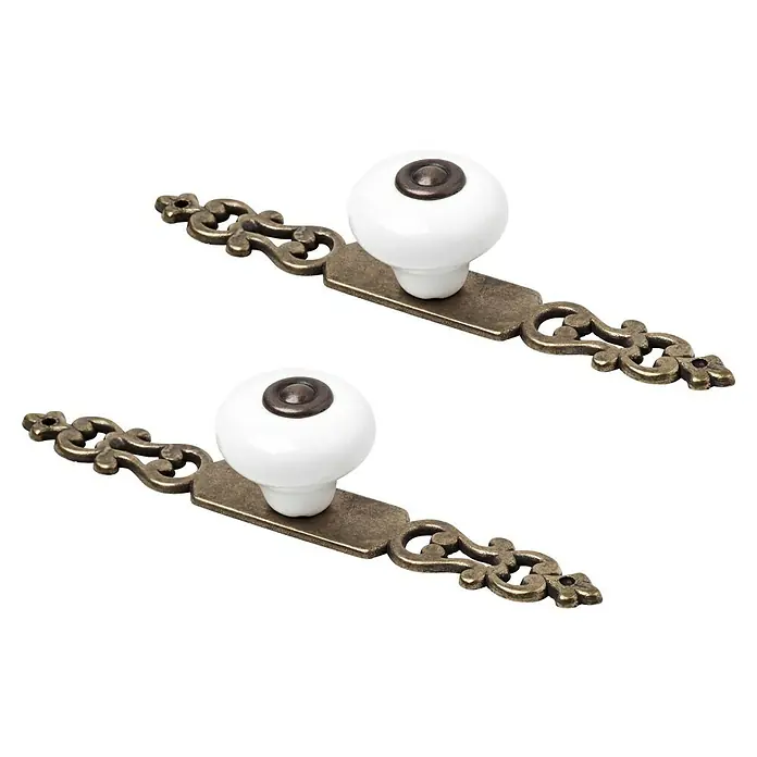 Rei Tirador para muebles 844 - Distancia entre orificios: 28 mm, Blanco/Cuero viejo, 2 ud. - Dos pomos de porcelana con soportes de latón ornamentados. Diseño elegante para muebles.