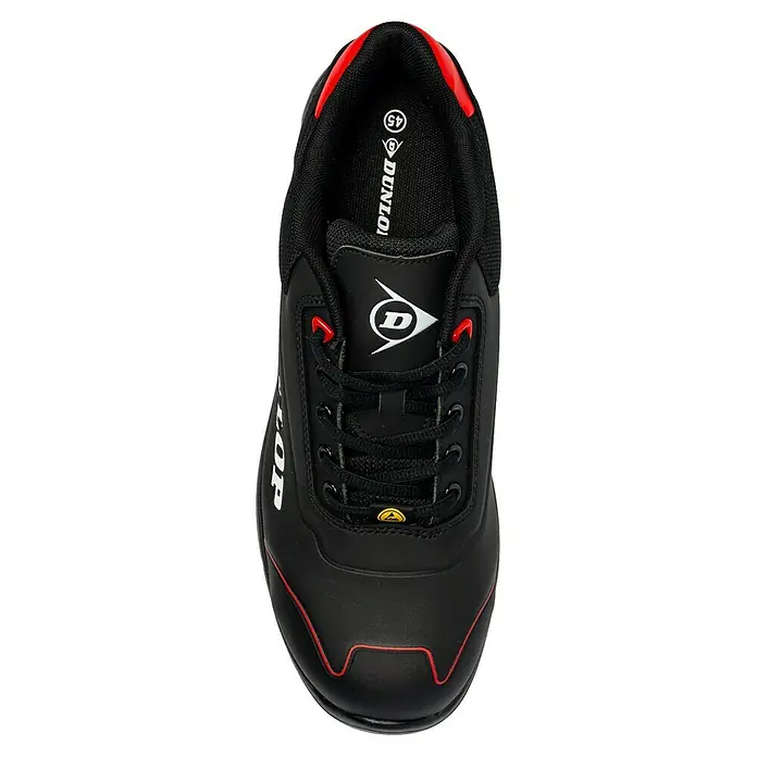Dunlop Zapato bajo de seguridad Matt - 44, Clase de protección según EN ISO 20345: S3, Negro - Primer plano de un zapato de seguridad negro Dunlop con detalles rojos, que combina protección y confort.