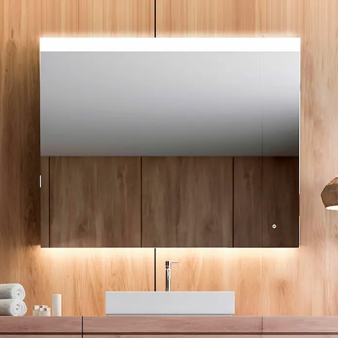 Camargue Espejo con luz Ilse Up & Down - An x Al: 120 x 80 cm - Un espejo de baño iluminado sobre un lavabo moderno, que combina elegancia y funcionalidad en su diseño.