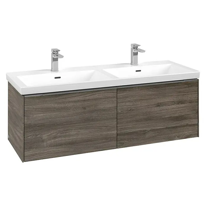 Villeroy & Boch Subway 3.0 Waschbeckenunterschrank - Stone Oak, Anzahl Schubladen: 2 Stk., Farbe Griff: Aluminium glänzend, B x T x H: 127,2 x 47,8 x 42,9 cm, Ohne Beleuchtung, Geeignet für Doppelwaschtisch - Doppelwaschtisch mit weißen Keramikbecken, Chromarmaturen und dunklem Holzmaserungsschrank.
