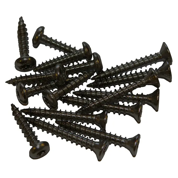 Plus Ersatzschrauben für Montage auf Pfosten - 4 x 30 mm, Schwarz, 24 Stk. - Nahaufnahme von einer Ansammlung von schwarzen Holzschrauben, die sich kreuzen und überlappen, ideal für Bau- und Heimwerkerprojekte.