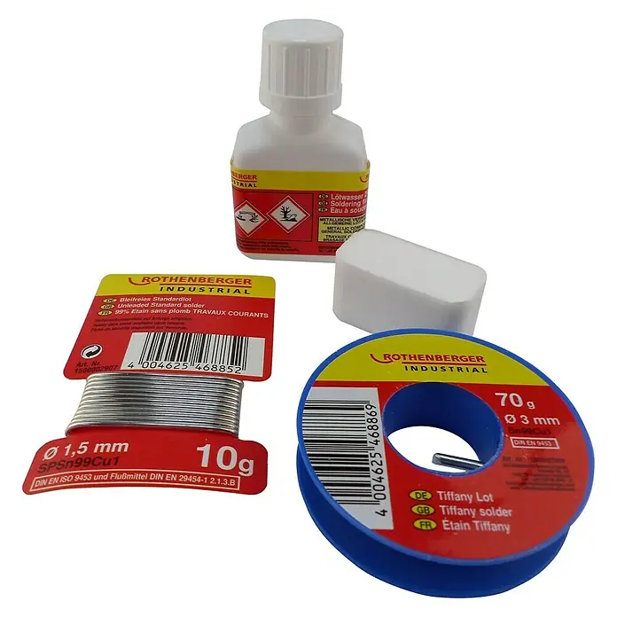 Rothenberger Industrial Set de soldadura - 4 pzs. - La imagen muestra una selección de productos de soldadura Rothenberger, incluyendo hilo de soldadura, líquido para soldar y estaño para diversas aplicaciones.