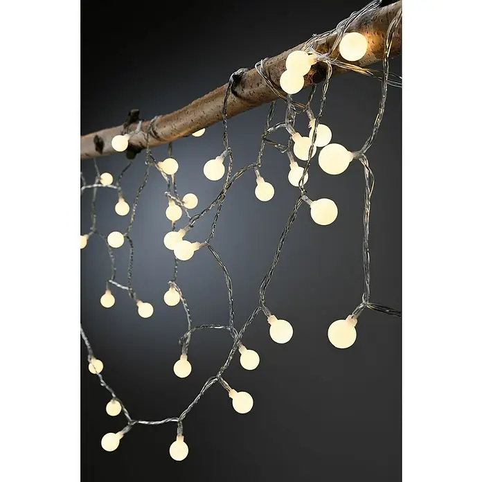 Paulmann Plug & Shine LED-Lichterkette - Außen, Lichtfarbe: Warmweiß, Anzahl Leuchtmittel: 72 Stk., Länge: 7,5 m - Dekorative Lichterkette mit kugelförmigen Lampen um einen Ast gewickelt, ideal für stimmungsvolle Beleuchtung im Innenbereich.