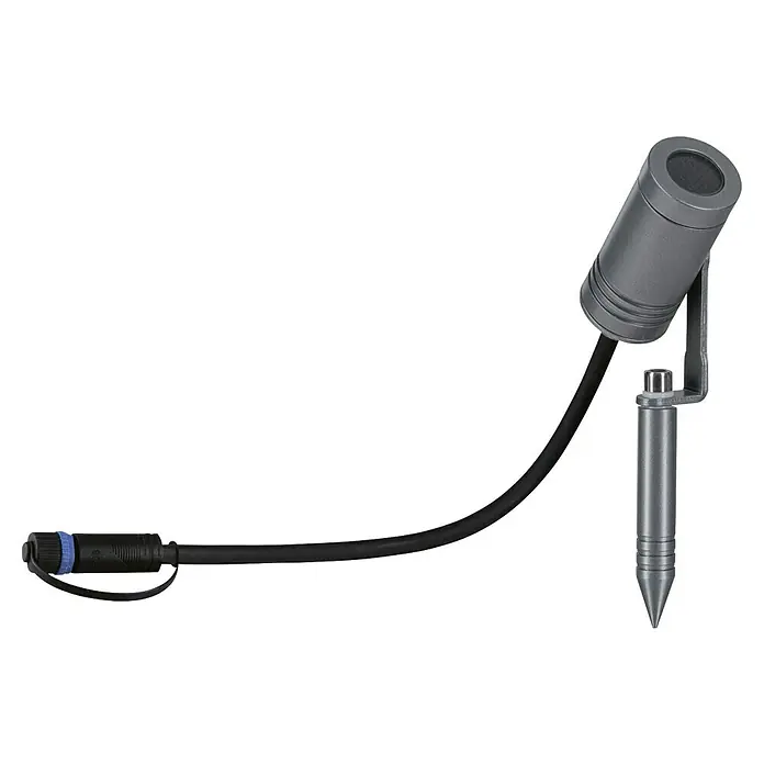 Paulmann Plug & Shine LED-Gartenspot Radix - 7 W, IP65, Warmweiß, Grau - Nahaufnahme eines Gartenstrahlers mit Erdspieß und Verbindungskabel vor schwarzem Hintergrund.