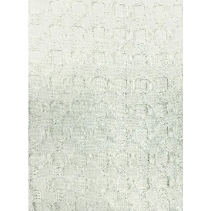 Manta para sofá Multiusos Waffle - Textil, Natural - Primer plano de una toalla de gofre blanca, mostrando la textura y el patrón de la tela, perfecta para la cocina o el baño.