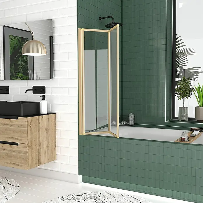Aurlane Badewannenaufsatz Duo - B x H: 70 x 120 cm, 2 Stk., Gold - Goldgerahmte faltbare Glasduschwand über einer Badewanne installiert.