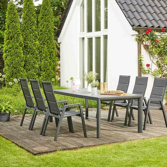 Siena Garden Urban Lights Gartenmöbel-Set Milano - 7 -tlg., Aluminium Matt, Anthrazit - Graue Outdoor-Essgruppe mit rechteckigem Tisch und sechs passenden Stühlen auf Holzterrasse.