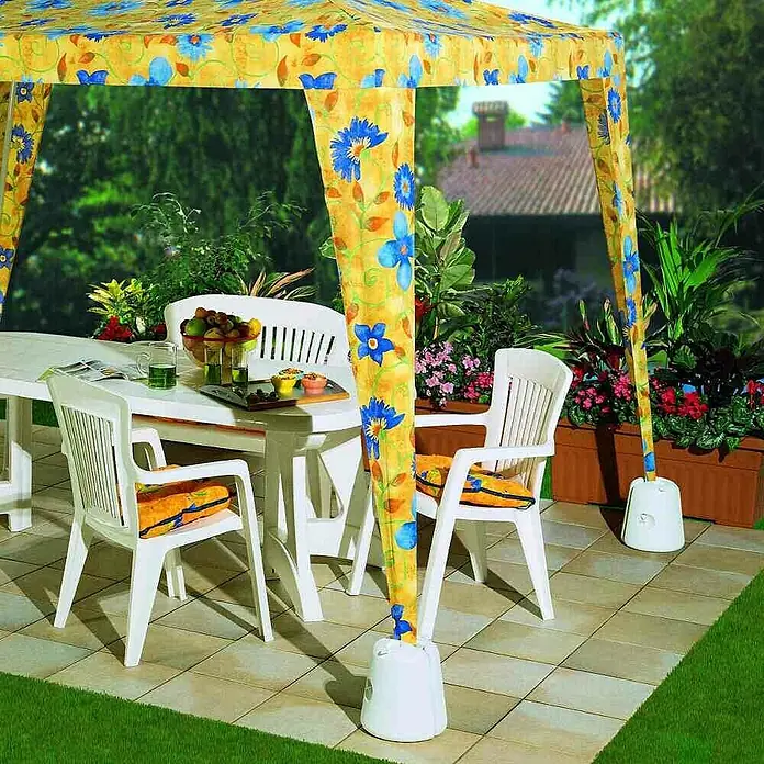 Siena Garden Schirmständer Elefant für Pavillonfüße - Passend für: Pavillonfüße, Weiß - Gelber Gartengazebo mit Blumenmuster spendet Schatten über weißer Terrassenmöblierung.