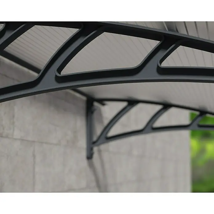 Palram – Canopia Pultvordach Apus - 119 x 76 x 25 cm, Anthrazitgrau - Nahaufnahme einer modernen Haustürüberdachung aus transparentem Polycarbonat mit robustem, grauem Rahmen und filigranen Trägern.