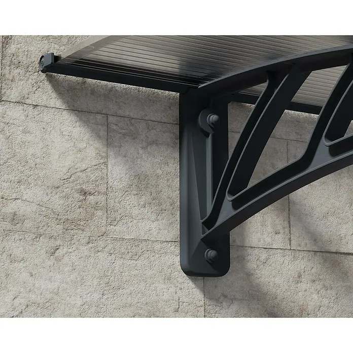 Palram – Canopia Pultvordach Apus - 119 x 76 x 25 cm, Anthrazitgrau - Nahaufnahme einer grauen Haustür-Überdachung aus Polycarbonat, befestigt an einer Mauer. Das Vordach bietet Schutz vor Regen und Sonne.