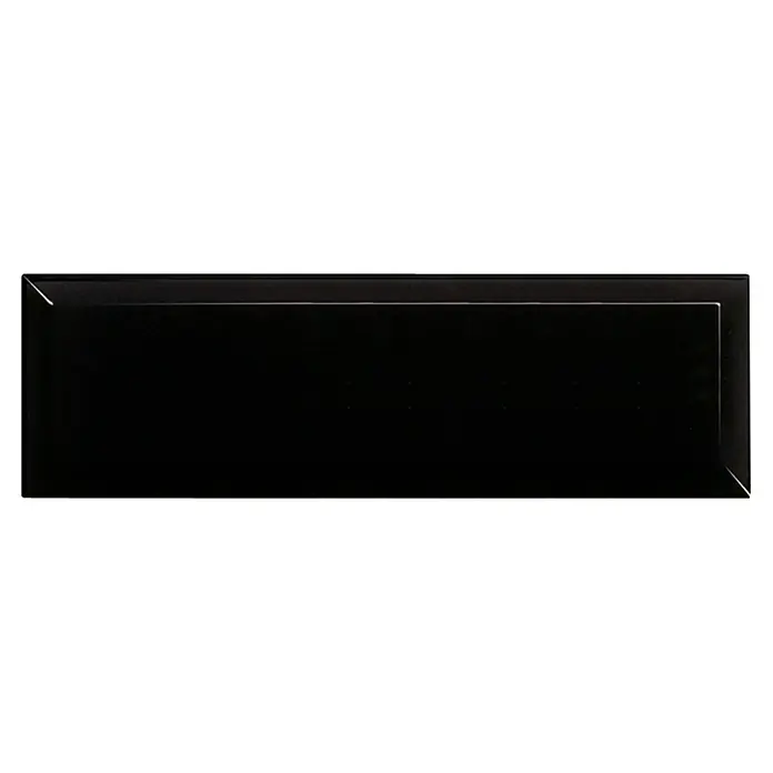 Modern Style Wandfliese Metro Biselado - 9,8 x 29,8 cm, Schwarz, Glänzend - Schwarze Metrofliese. Die glänzende, rechteckige Fliese ist ideal für Küchen und Bäder und bietet eine elegante, zeitlose Ästhetik.