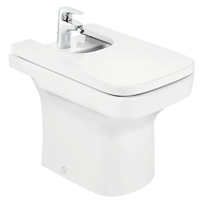 Roca Tapa de bidé Dama-N - Blanco, Plástico termoendurecido - Primer plano de un bidé blanco con grifo. Diseño elegante para baños modernos.