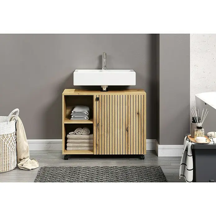 Trendteam Niklas Waschtischunterschrank - B x T x H: 80 x 42 x 64 cm, Evoke Eiche, Strukturiert - Ein moderner Waschtischunterschrank aus Holz mit einem weißen Aufsatzwaschbecken und Stauraum für Handtücher.