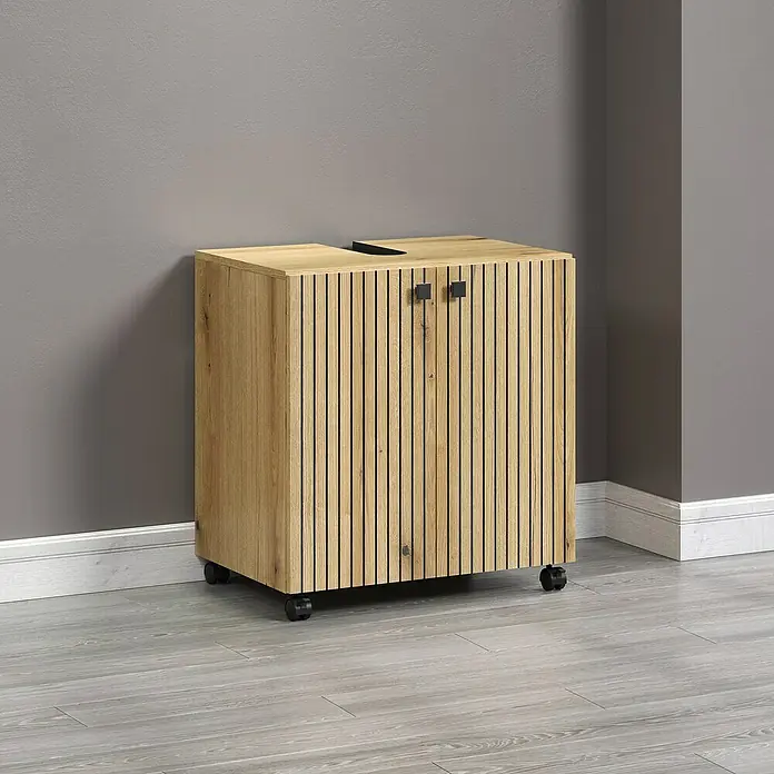Trendteam Niklas Waschtischunterschrank - B x T x H: 60 x 42 x 64 cm, Evoke Eiche, Strukturiert - Das Bild zeigt einen Büroschrank aus Holz mit Rollen und Lamellenfront vor einer grauen Wand. Praktische Aufbewahrungslösung fürs Büro.