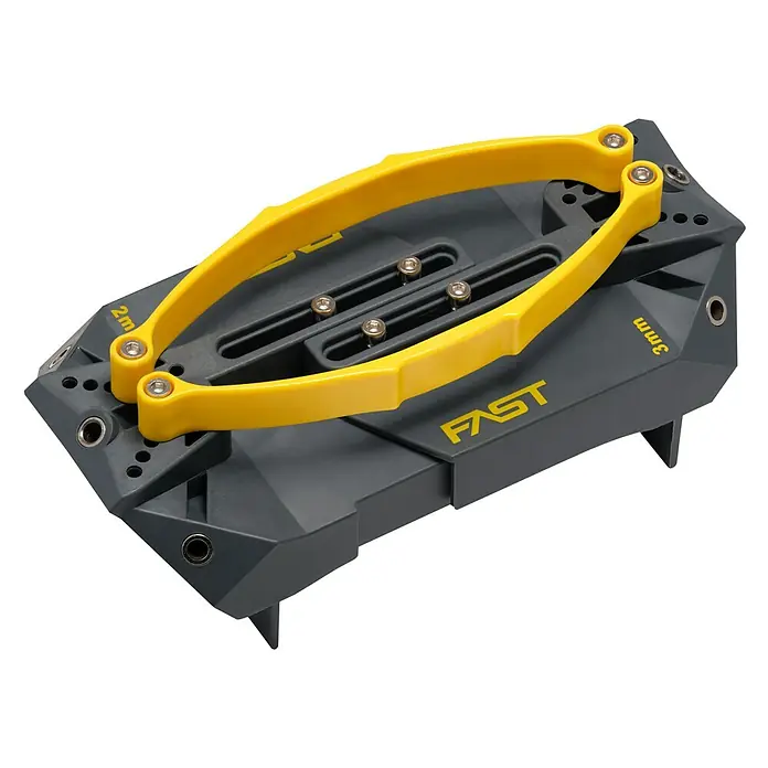 Fast Bohrhilfe - L x B x H: 190 x 90 x 70 mm, Grau/Gelb - Graues Bauwerkzeug mit gelbem Ovalgriff, 'FAST'-Branding und '2m', '3mm' Markierungen.