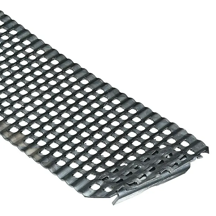 Stanley Hoja de repuesto surform - Largo: 250 mm, Específico para: Cepillo surform, Fino - Detalle cercano de una robusta lámina de metal perforada, ideal para superficies antideslizantes y aplicaciones industriales.