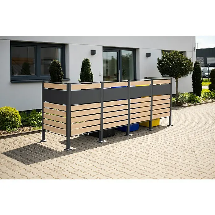 Westmann Mülltonnenbox Verkleidung Planum - 90 x 330 x 120 cm, Anthrazit/Holzoptik - Eine Mülltonnenbox mit Holzverkleidung und grauem Rahmen, die diskret im Außenbereich platziert ist und für Ordnung sorgt.