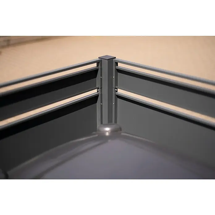 Westmann Mülltonnenbox Verkleidung Planum - 90 x 170 x 120 cm, Anthrazit/Holzoptik - Detailaufnahme einer modernen, anthrazitfarbenen Metall-Eckverbindung eines Zauns, die durch klare Linien und eine minimalistische Ästhetik besticht.