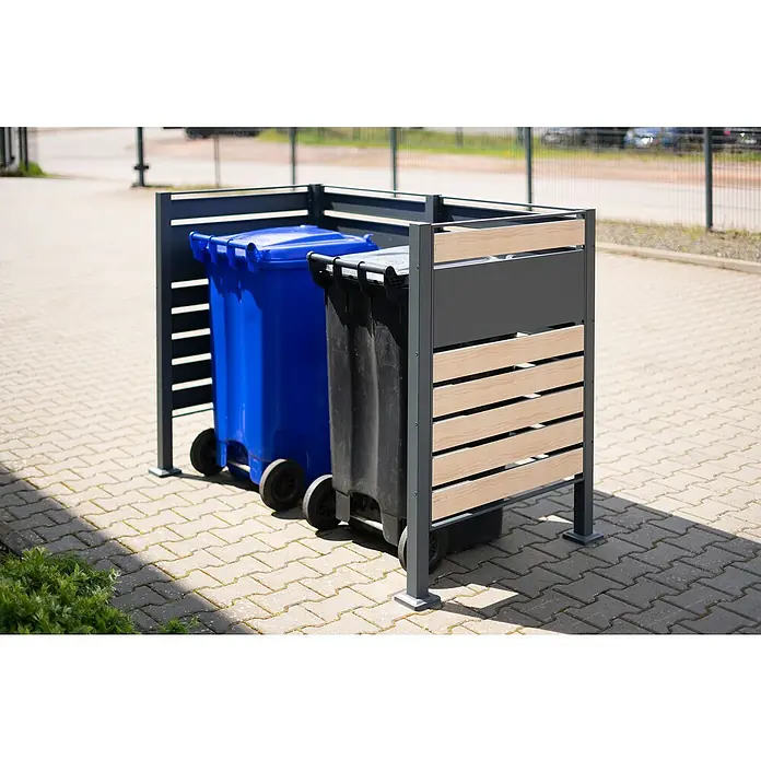 Westmann Mülltonnenbox Verkleidung Planum - 90 x 170 x 120 cm, Anthrazit/Holzoptik - Zwei Mülltonnen in einer modernen Mülltonnenbox mit grauen Metallrahmen und hellen Holzelementen, die stilvolle Ordnung im Außenbereich schafft.