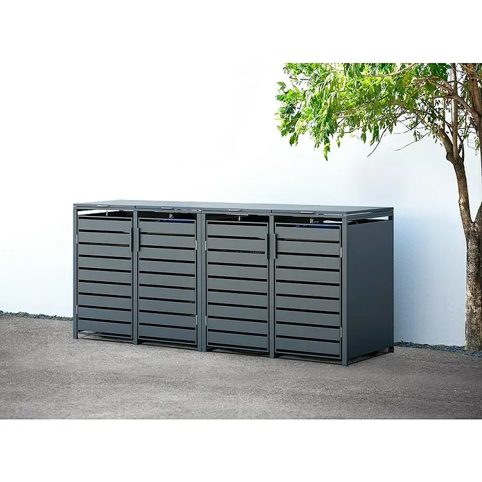 Westmann Mülltonnenbox Kubus - Stahl, Anthrazit, Geeignet für Anzahl Mülltonnen: 4 Stk. - Eine Mülltonnenbox aus Metall für drei Mülltonnen, die sich vor einer weißen Wand und neben einem Baum befindet.