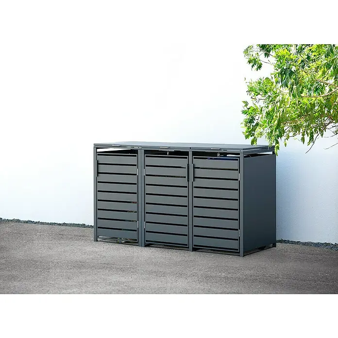 Westmann Mülltonnenbox Kubus - Stahl, Anthrazit, Geeignet für Anzahl Mülltonnen: 3 Stk. - Drei graue Mülltonnenboxen aus Metall stehen vor einer weißen Wand und bieten eine stilvolle Mülltonnenverkleidung für den Außenbereich.