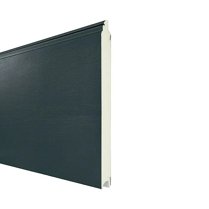 Solid Elements Garagentor Solid Pro Iso - 2.500 x 2.125 mm, Anthrazit/Creme Weiß - Nahaufnahme eines modernen, isolierten Garagentorabschnitts in dunklem Anthrazit, ideal für energieeffiziente Neubauten und Renovierungen.