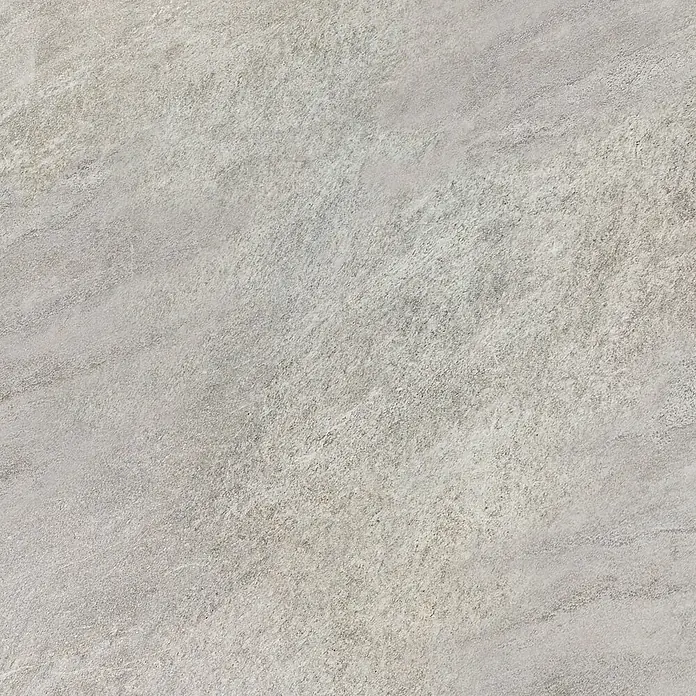 Diephaus Terrassenfliese Columbia - 60 x 60 x 4 cm, Concreto Quarzit, Beton - Das Bild zeigt eine Nahaufnahme einer grauen Fliese mit einer unregelmäßigen, leicht rauen Textur, die eine natürliche Steinoptik imitiert.