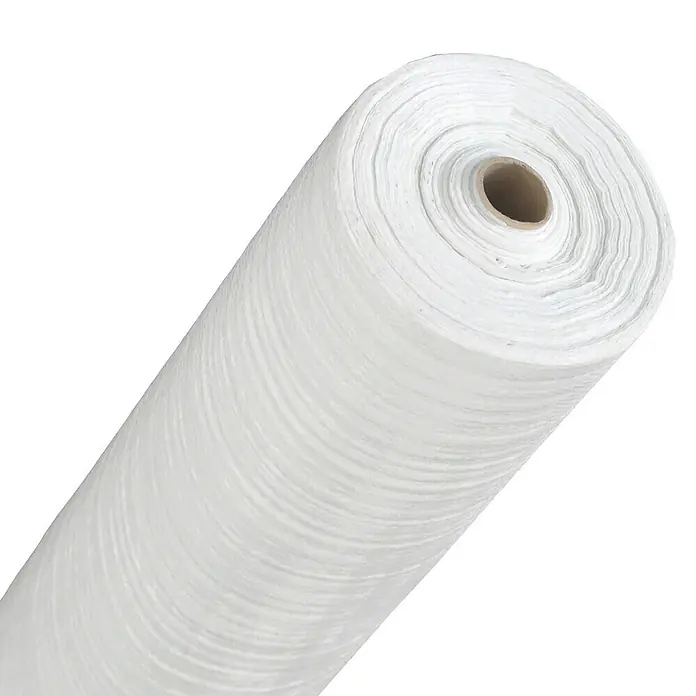 Faura Tejido contra malas hierbas - 10 x 1,25 m, Blanco - Primer plano de un gran rollo de geotextil blanco, perfecto para proyectos de construcción y paisajismo.