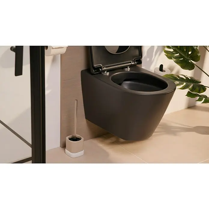 Venus Nara WC-Bürstengarnitur - Polyresin, Beige - Nahaufnahme einer modernen, wandhängenden Toilette in dunklem Anthrazit, die das elegante Design und die hochwertige Verarbeitung betont.