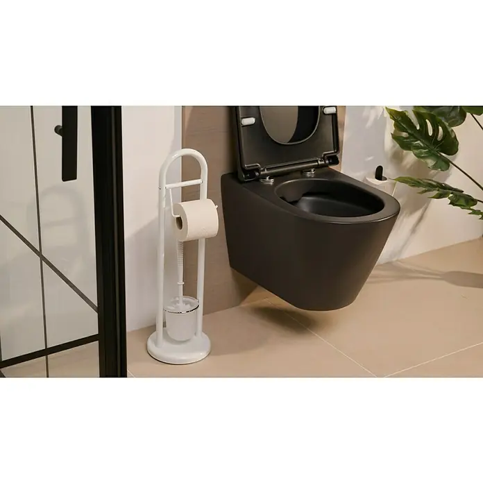Venus WC-Kombi-Bürstengarnitur Amicella - Höhe: 63 cm, Weiß, Metall - Ein elegantes Badezimmer mit einer schwarzen, wandmontierten Toilette und einem weißen Toilettenpapierhalter mit Bürste.