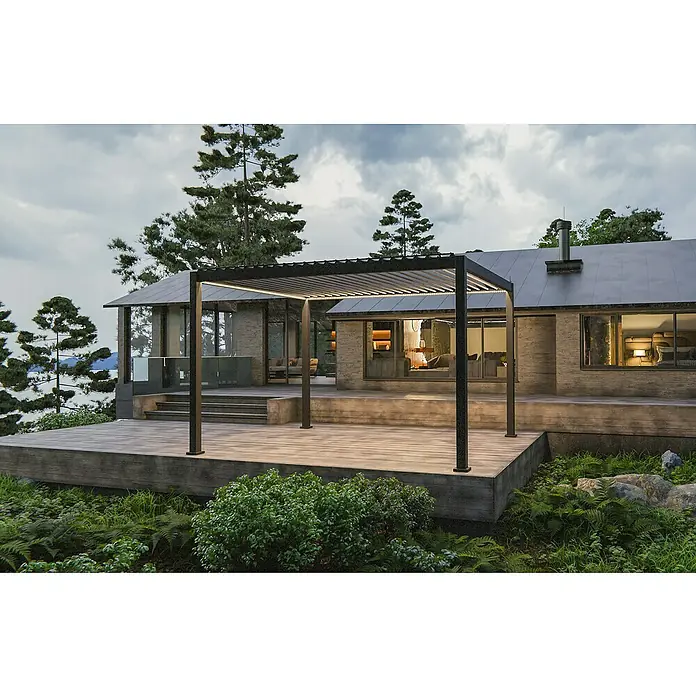 Sunfun Lamellenpavillon Korfu - B x T: 400 x 300 cm, Farbe Gestell: Anthrazit, Aluminium - Moderne Pergola mit stimmungsvoller Beleuchtung auf einer Holzterrasse, die zu einem stilvollen Haus gehört.