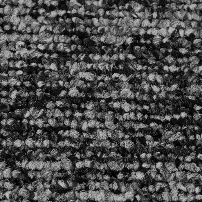 Teppichfliese Explore - Schlinge, 100 % Polypropylen, Metal - Nahaufnahme eines Teppichs mit einer dichten, faserigen Textur in verschiedenen Grautönen. Perfekt für gemütliche Innenräume.