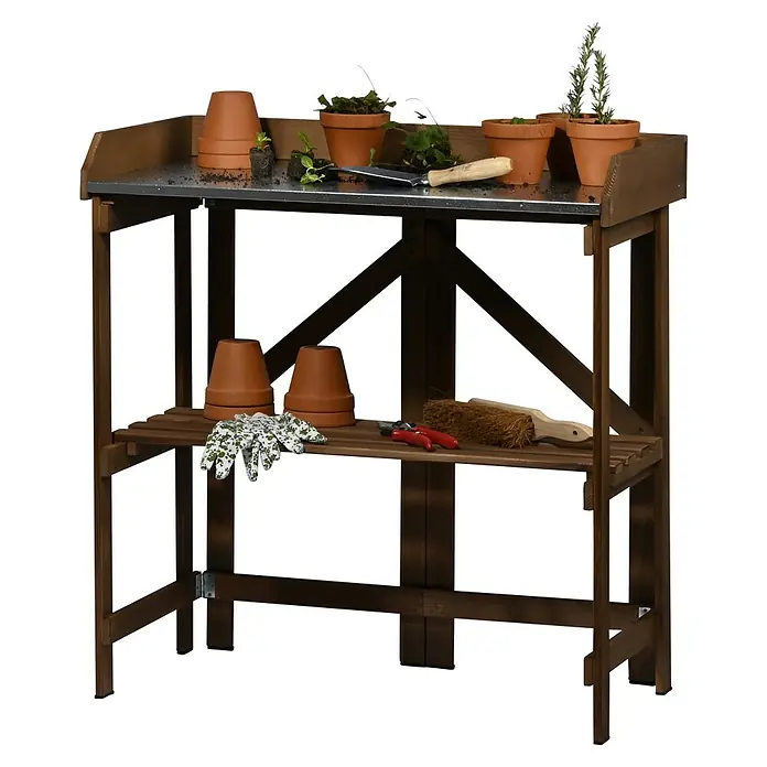 Dobar Pflanztisch Faltbar mit Ablage - 86 x 43 x 88 cm, Holz, Dunkelbraun - Ein brauner Holztisch mit Arbeitsfläche, bestückt mit Blumentöpfen, Erde, Gartengeräten und Pflanzen, ideal für Gartenarbeiten.