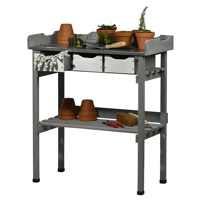 Dobar Pflanztisch - 78 x 38 x 88 cm, Holz, Grau - Eine graue Gartenarbeitsbank mit Töpfen, Gartengeräten und Handschuhen. Die Werkbank hat Schubladen und eine Ablagefläche für Zubehör.