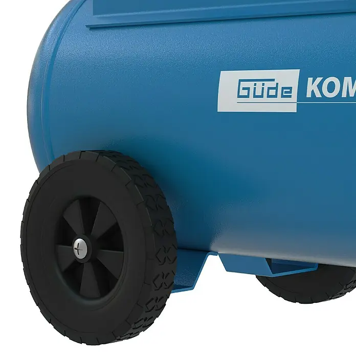 Güde Kompressor 580/10/50/400V - 2.200 W, Max. Druck: 10 bar, 50 l, Schmierung: Ölgeschmiert - Blauer Luftkompressortank mit texturierter Oberfläche, schwarzen Rädern und weißem „Güde KOM“-Logo.