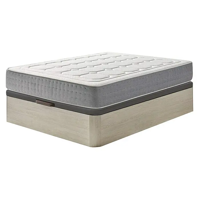 Unique Canapé Plus con colchón Supper - L x An x Al: 190 x 90 x 36 cm, Roble Ártico - Primer plano de un colchón que descansa sobre una estructura de cama. El colchón es blanco con un borde gris y un patrón acolchado. La estructura de la cama es beige claro.