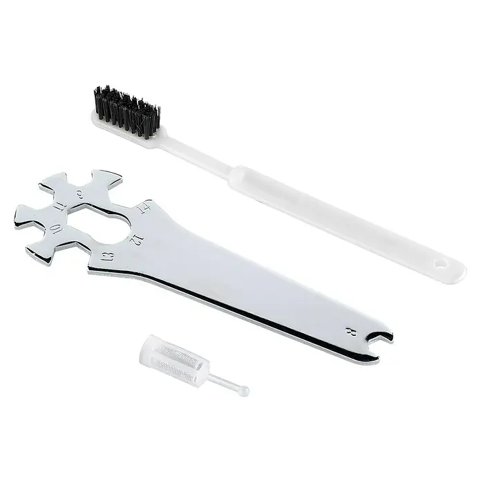 PowerPlus Pistola de pintura neumática POWAIR0109 - Presión de funcionamiento: 3 bar, Volumen de recipiente: 600 ml - La imagen muestra un kit de herramientas para bicicleta que consta de una llave, un cepillo y un tronchacadenas. ¡Ideal para el mantenimiento de la bici!