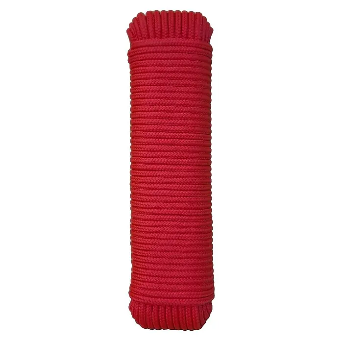 Cuerda - 5 mm x 25 m, Plástico, Rojo, Carga soportada: 300 kg - Primer plano de una cuerda de algodón roja enrollada cuidadosamente, perfecta para manualidades o como elemento decorativo.