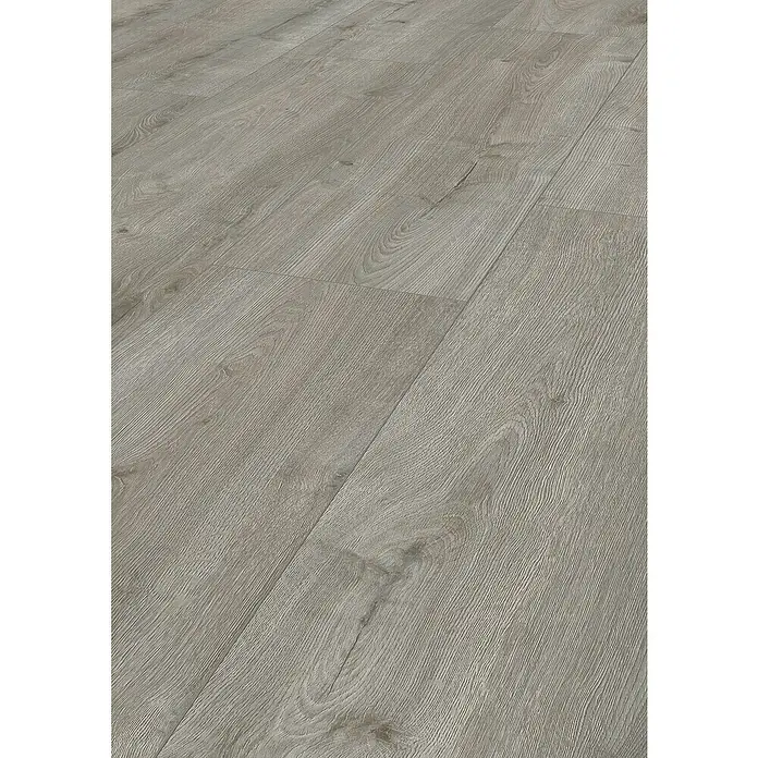 LOGOCLIC Vinto Laminat - Eiche Calais, Landhausdiele, 1.288 x 330 x 8 mm - Nahaufnahme von hellem Laminatboden mit Holzmuster. Das Laminat bietet eine robuste und pflegeleichte Oberfläche in Holzoptik.