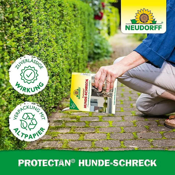 Neudorff Protectan Hunde-Schreck - Reichweite ca.: 13 m - Eine Person hält eine Packung Protectan Hunde-Schreck von Neudorff, ein Granulat, um Hunde fernzuhalten, ohne ihnen zu schaden.